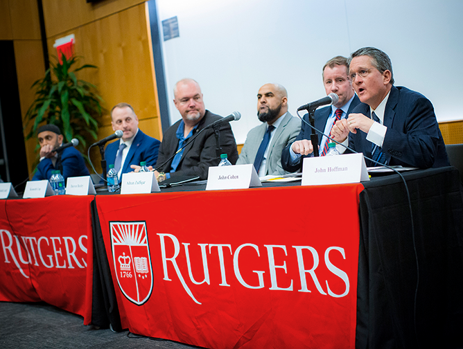 Panelists Imam Khalid Latif, Kenneth Cop, Darren Baxley, Adnan Zulfiqar, and John Hoffman